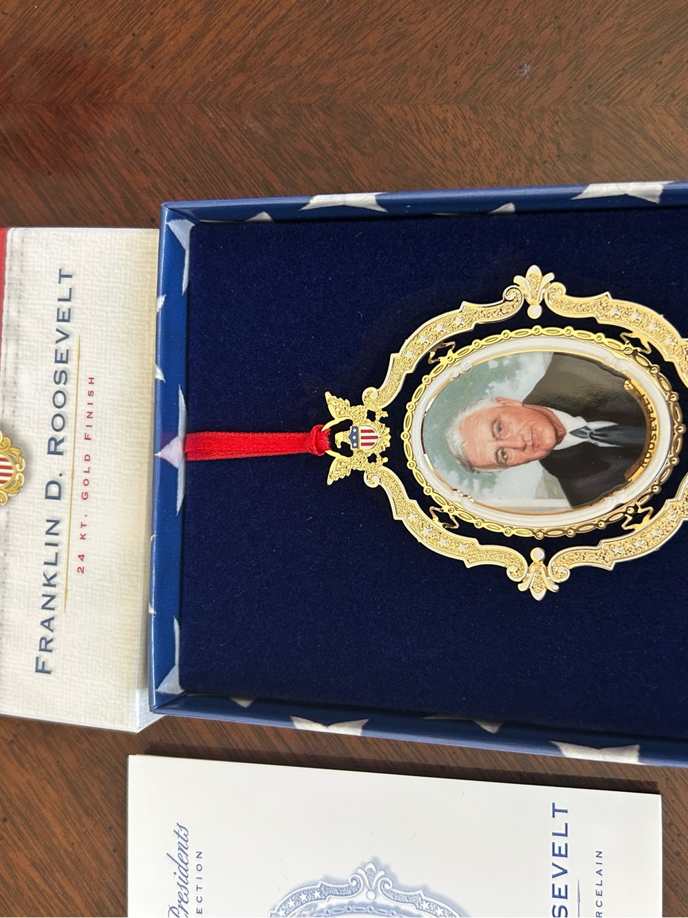Gold Finish Decorative Portrait Ornament with Red Ribbon